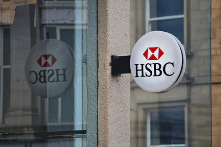 HUDDERSFIELD, UK - JULY 10, 2016: HSBC bank branch in Huddersfield, UK. HSBC is one of largest bank groups, holding assets of USD 2.69 trillion worldwide (2012).のeditorial素材