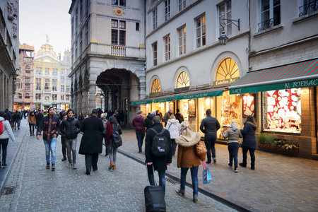BRUSSELS, BELGIUM - NOVEMBER 19, 2016: People visit Brussels Old Town area. Brussels is the capital city of Belgium. 1.8 million people live in its metro area.のeditorial素材