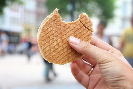 Stroopwafel in Amsterdam - typical Dutch food - two circular pieces of waffle filled with caramel-like syrup.の写真素材
