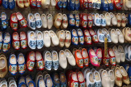AMSTERDAM, NETHERLANDS - JULY 8, 2017: Dutch wooden shoes known as clogs at a gift store in...