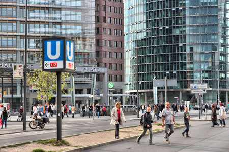 BERLIN, GERMANY - AUGUST 27, 2014: People walk by Potsdamer Platz railway station in Berlin. The station has daily ridership of 80,000.のeditorial素材