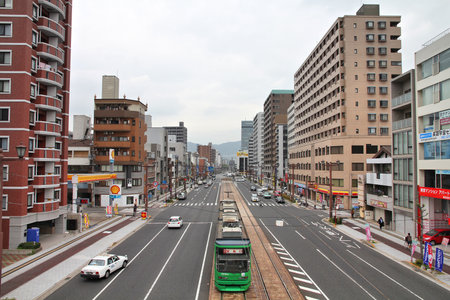 HIROSHIMA, JAPAN - APRIL 21, 2012: Street view in downtown Hiroshima, Japan. Completely destroyed by atomic bomb, Hiroshima is the largest city of Chugoku region with 1.17m population.のeditorial素材