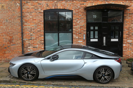 LEEDS, UK - JULY 11, 2016: BMW i8 luxury sports car parked in Leeds, Yorkshire, UK. There were 30.9 million cars registered in the UK in 2016.のeditorial素材