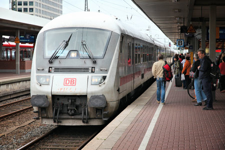 DORTMUND, GERMANY - JULY 16, 2012: People board ICE train of Deutsche Bahn in Dortmund, Germany. In 2009 ICE Express trains transported more than 77 million passengers.のeditorial素材