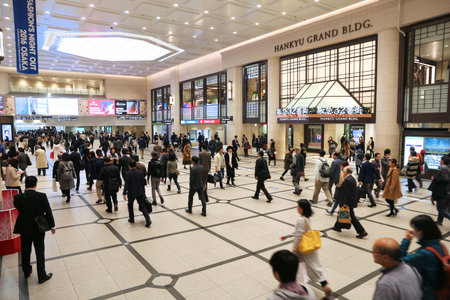 OSAKA, JAPAN - NOVEMBER 22, 2016: Passengers hurry at Hankyu Umeda Station in Osaka, Japan. Hankyu Umeda Station opened in 1910 and is operated by Hankyu Corporation.のeditorial素材