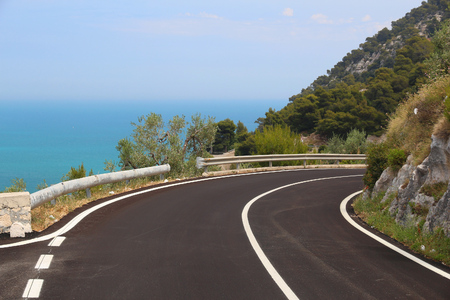 Winding road in Italy - Gargano National Park. Road bend.の写真素材