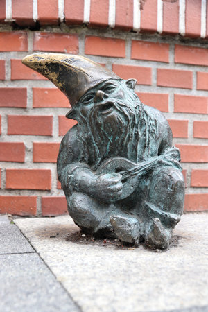 WROCLAW, POLAND - MAY 11, 2018: Gnome small statue in Wroclaw, Poland. Wroclaw has 350 gnome sculptures around the city.のeditorial素材