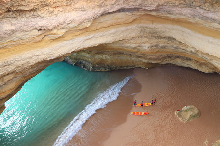 ALGARVE, PORTUGAL - MAY 27, 2018: Sea kayaking at Benagil Beach in Algarve region, Portugal. Coastal region of Algarve attracts more than 17 million tourists annually.のeditorial素材