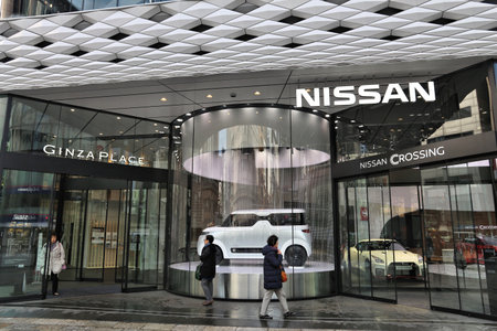 TOKYO, JAPAN - DECEMBER 1, 2016: People Nissan Crossing car showroom at Ginza district of Tokyo, Japan. Ginza is a legendary shopping area in Chuo Ward of Tokyo.のeditorial素材