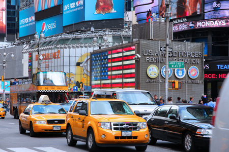 NEW YORK, USA - JULY 2, 2013: Taxi cabs at Times Square in New York. The square at junction of...