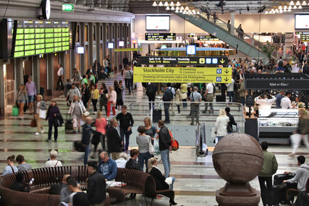 STOCKHOLM, SWEDEN - AUGUST 22, 2018: People hurry at Stockholm Central Station in Sweden. The station has approximately 200,000 daily visitors.のeditorial素材