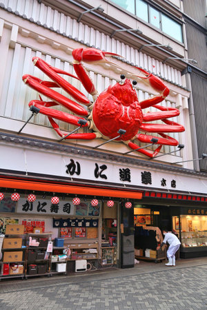 OSAKA, JAPAN - NOVEMBER 23, 2016: Crab decoration at a restaurant at Dotonbori street in Osaka, Japan. Dotonbori is the main entertainment area of Osaka.のeditorial素材