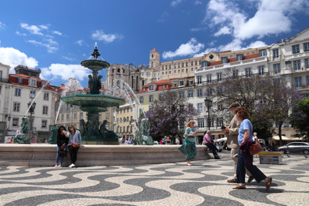 LISBON, PORTUGAL - JUNE 5, 2018: People visit Rossio Square in Lisbon, Portugal. Lisbon is the 11th-most populous urban area in the EU (2.8 million people).のeditorial素材