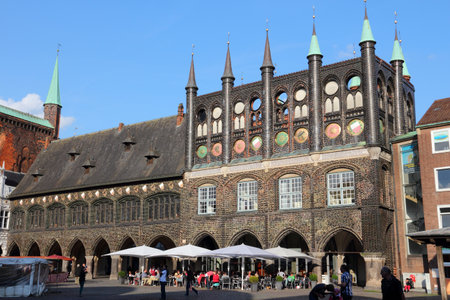 LUBECK, GERMANY - AUGUST 29, 2014: People visit Old Town in Lubeck, Germany. Lubeck is the 2nd largest city in Schleswig-Holstein region. Its old town is a UNESCO World Heritage Site.のeditorial素材
