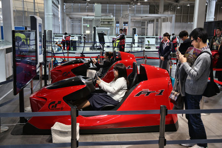 TOKYO, JAPAN - DECEMBER 2, 2016: People visit Mega Web: Toyota City Showcase. Mega Web is a public exhibition of Toyota car manufacturer.のeditorial素材