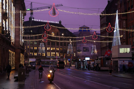 AMSTERDAM, NETHERLANDS - DECEMBER 6, 2018: Christmas decorations of Damrak street in Amsterdam, Netherlands. Amsterdam is the capital city of The Netherlands.のeditorial素材