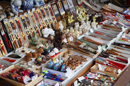MIYAJIMA, JAPAN - APRIL 21, 2012: Souvenirs in a gift shop at Itsukushima Island in Japan. The island is a UNESCO World Heritage Site and is a popular tourism destination.のeditorial素材
