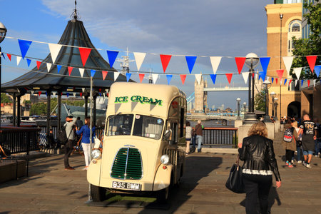 LONDON, UK - JULY 8, 2016: People walk along London Embankment in the UK. London is the most populous city in the UK with 13 million people living in its metro area.のeditorial素材