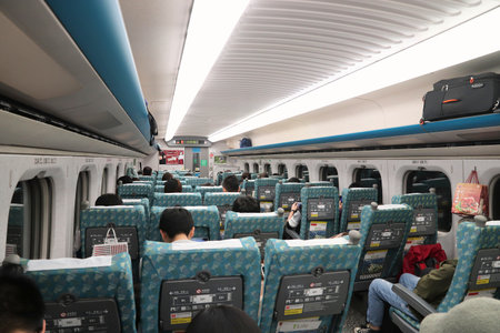 TAIPEI, TAIWAN - DECEMBER 2, 2018: People ride the high speed train (HSR) at in Taiwan. Taiwan High Speed Rail served 60 million passenger journeys in 2017.のeditorial素材