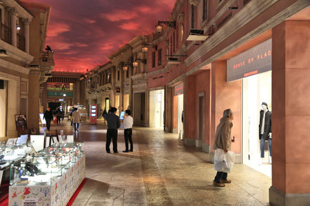 TOKYO, JAPAN - DECEMBER 2, 2016: People visit Venus Fort shopping center in Odaiba, Tokyo. The mall is famous for its artificial sky and renaissance style theme.のeditorial素材