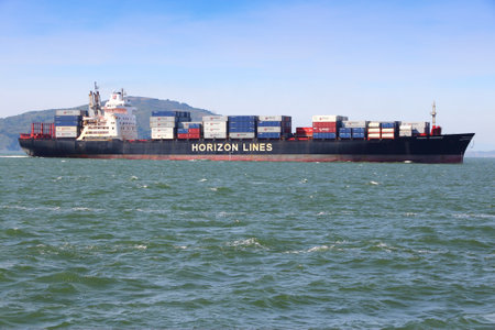 SAN FRANCISCO, USA - APRIL 8, 2014: Horizon Lines container ship sails in San Francisco bay. Horizon...