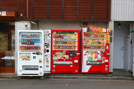 TOKYO, JAPAN - NOVEMBER 29, 2016: Vending machines with drinks in Tokyo. Japan is famous for its vending machines, with more than 5.5 million machines nationwide.のeditorial素材