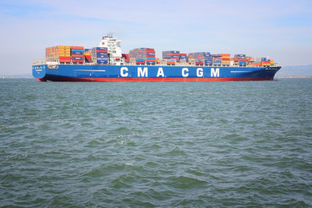 SAN FRANCISCO, USA - APRIL 8, 2014: CMA CGM Centaurius container ship sails in San Francisco bay. CMA CGM is the 3rd largest container shipping company in the world with 170 routes.のeditorial素材