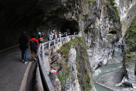 TAROKO NATIONAL PARK, TAIWAN - NOVEMBER 25, 2018: Tourists visit Swallow Grotto (Yanzikou) Trail at Taroko National Park, Taiwan.のeditorial素材