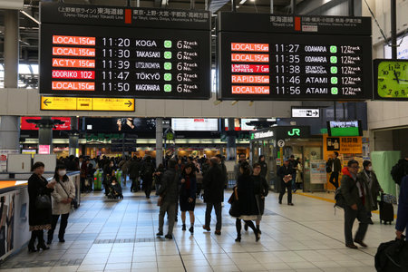 TOKYO, JAPAN - DECEMBER 3, 2016: Passengers hurry in Shinagawa Station in Tokyo. The station was used by 335,661 passengers daily in 2013.のeditorial素材