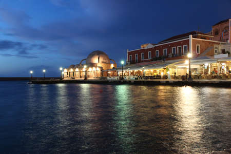 Chania, town on Crete island in Greece. Old town and Venetian harbor evening view.の写真素材