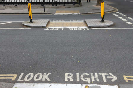 London pedestrian signs - look right and look left. Traffic warning.の写真素材