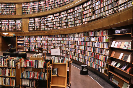 STOCKHOLM, SWEDEN - AUGUST 22, 2018: People visit the rounded building of Stockholm Public Library (Stadsbiblioteket). The library was opened in 1928.のeditorial素材