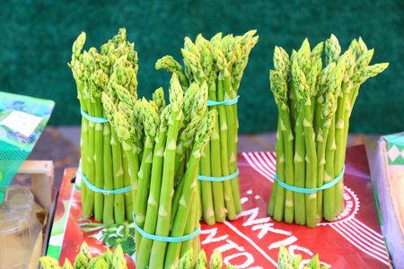 NUREMBERG, GERMANY - MAY 7, 2018: Asparagus at local vegetable market in Nuremberg, Germany. Nuremberg is located in Middle Franconia. 511,628 people live here.のeditorial素材