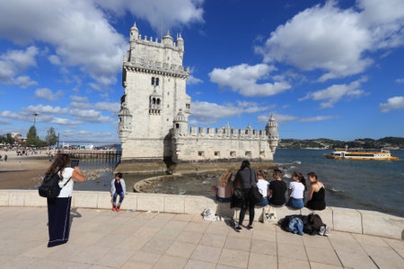 LISBON, PORTUGAL - JUNE 5, 2018: People visit Torre de Belem Fortification on Tagus River in Lisbon, Portugal. Lisbon is the 11th-most populous urban area in the EU (2.8 million people).のeditorial素材