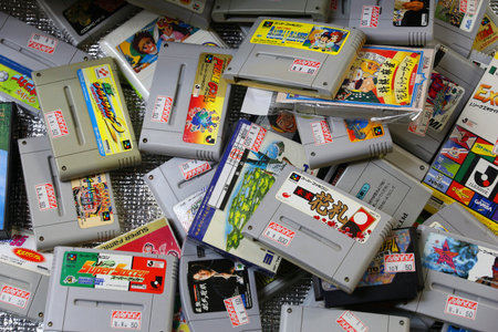 TOKYO, JAPAN - DECEMBER 4, 2016: Retro video game collectible store SNES bargain bin in Akihabara...