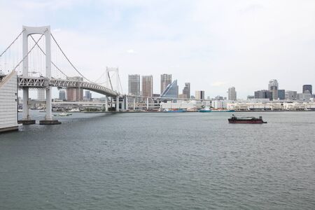 Tokyo Rainbow Bridge - city view with skyline.の写真素材