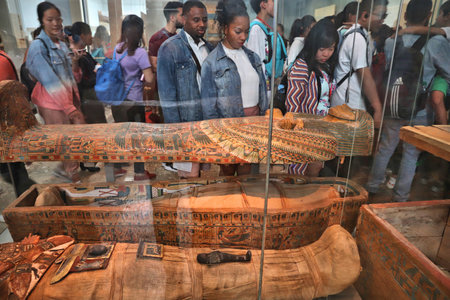 LONDON, UK - JULY 14, 2019: People visit Egyptian mummies in British Museum, London. The museum was established in 1753 and holds approximately 8 million objects.のeditorial素材