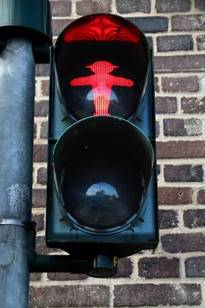 German traffic light - pedestrian red light. Typical pedestrian symbol in Germany.の写真素材