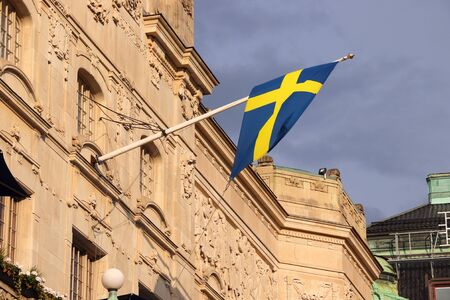 Flag of Sweden on Stockholm landmark. The Royal Dramatic Theatre (known as Dramaten).の写真素材