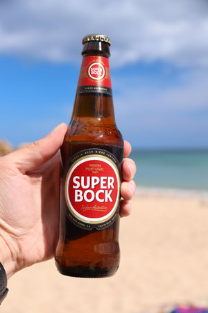 ALGARVE, PORTUGAL - JUNE 1, 2018: Super Bock brand beer in Portugal. Super Bock Group is the largest Portuguese beverage company.のeditorial素材