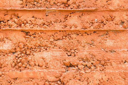Orange grunge wall texture. Rough grungy background.