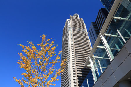 TOKYO, JAPAN - DECEMBER 2, 2016: Acty Shiodome residential building in Tokyo. It was built by Takenaka Corporation, Sumitomo Mitsui Construction and Ando Corporation.のeditorial素材