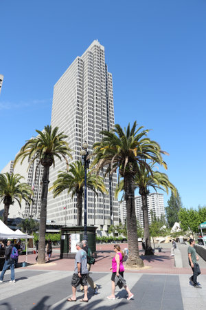 SAN FRANCISCO, USA - APRIL 9, 2014: People walk below Four Embarcadero Center skyscraper in San Francisco, USA. It is the 9th tallest building in San Francisco with height of 570 ft (174 m).のeditorial素材
