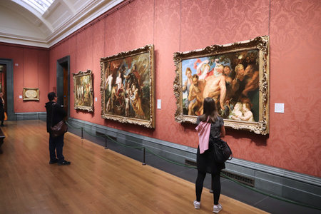 LONDON, UK - JULY 12, 2019: Tourists visit National Gallery in London. It is the 3rd most visited museum in the UK with 5.7 million annual visitors.のeditorial素材