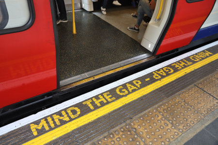 LONDON, UK - JULY 13, 2019: Mind The Gap warning atLondon Underground station. London Underground is the 11th busiest metro system worldwide with 1.1 billion annual rides.のeditorial素材