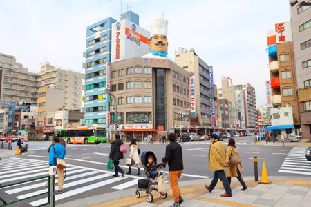 TOKYO, JAPAN - DECEMBER 4, 2016: People visit Kappabashi area of Asakusa in Tokyo, Japan. Kappabashi Street is known for its multiple stores selling restaurant equipment.のeditorial素材