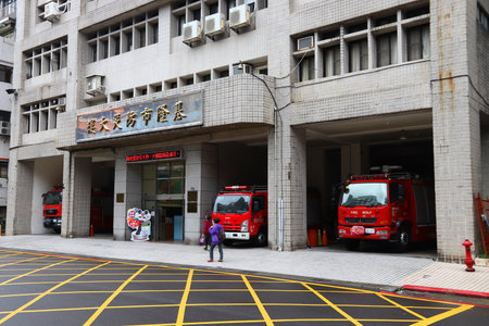 KEELUNG, TAIWAN - NOVEMBER 23, 2018: Fire station in Keelung, Taiwan. Mitsubishi Fuso, Isuzu and MAN...