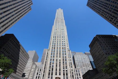 NEW YORK, USA - JULY 5, 2013: Rockefeller Center skyscraper in New York. Famous building complex was built in 1930-1939 and is considered National Historic Landmark.のeditorial素材
