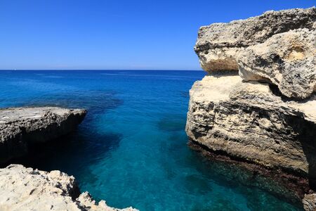Salento coast landscape in Italy. Roca Vecchia in Apulia region.の写真素材