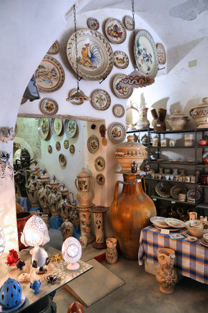 GROTTAGLIE, ITALY - JUNE 3, 2017: A traditional ceramics handicraft shop in Grottaglie, Italy. Grottaglie is a famous handmade ceramics production town in the region of Apulia.のeditorial素材